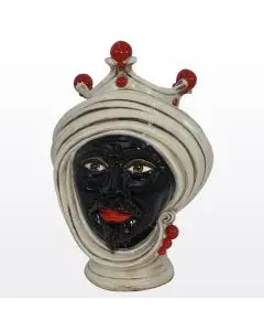 Ivory & red Sicilian Moorish head featuring a Moorish character. It is handcrafted in Caltagirone, Italy.