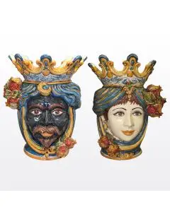 Pair of Sicilian Moorish heads with pomegranates. They feature a man and a woman decorated in rich shades of blue and orange. Handcrafted in Caltagirone, Italy.