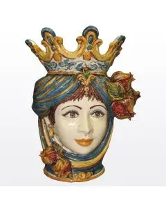 Sicilian Moorish head with pomegranates. It features a female character decorated in rich shades of blue and orange. It is handcrafted in Caltagirone, Italy. Large