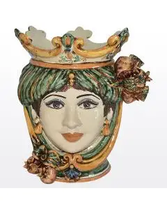 Sicilian Moorish head with pomegranates. It features a female character decorated in rich shades of green and orange. It is handcrafted in Caltagirone, Italy. Small
