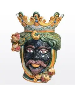 Sicilian head with pomegranates. It features a Moorish character decorated in rich shades of green and orange. It is handcrafted in Caltagirone, Italy. Large