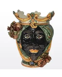 Sicilian head with pomegranates. It features a Moorish character decorated in rich shades of green and orange. It is handcrafted in Caltagirone, Italy. Small