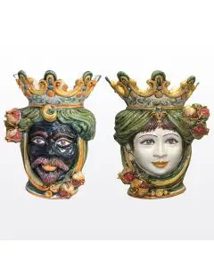 Pair of Sicilian Moorish heads with pomegranates. They feature a man and a woman decorated in rich shades of green and orange. Handcrafted in Caltagirone, Italy.