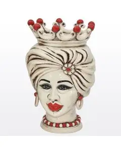 Sicilian Moorish head featuring a female character decorated in shades of antique ivory and red. It is handcrafted in Caltagirone, Italy.