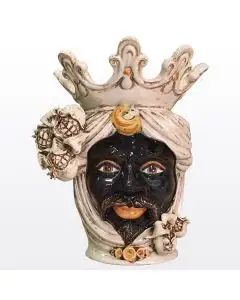Sicilian head with pomegranates. It features a Moorish character decorated in rich shades of antique ivory. It is handcrafted in Caltagirone, Italy.