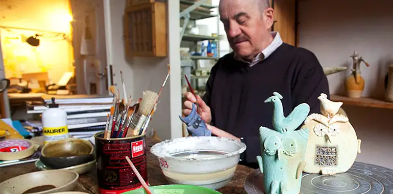 The Italian artist Riccardo Biavati at work in his studio, La Bottega delle Stelle