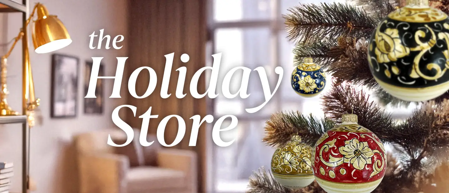 A Christmas tree decorated with Italian hand-painted Christmas ball ornaments