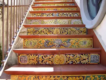 Handmade tiled floors, wall tiles and stair risers