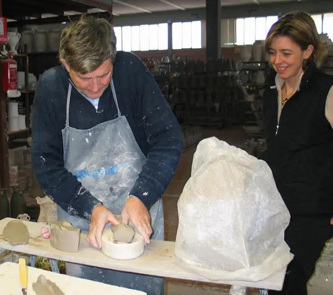 Handmade Italian products - Tiziana while learning about IMA's ceramics production process